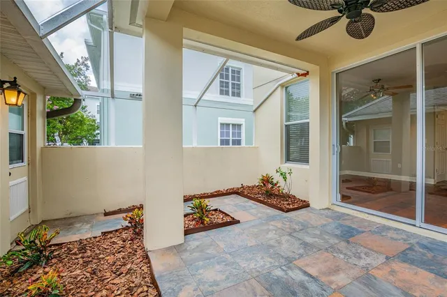 a bedroom with furniture and window