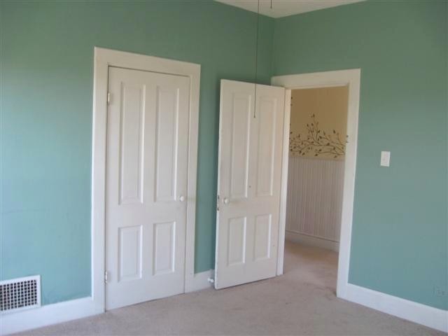 11443 West Warren Road Winslow, IL 61089 - Photo 9 of 9 an empty room with closet and a bathroom