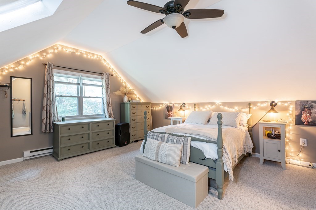 9 Village Way, Unit F Norton, MA 02766 - Photo 15 of 20 a spacious bedroom with a bed and a dresser