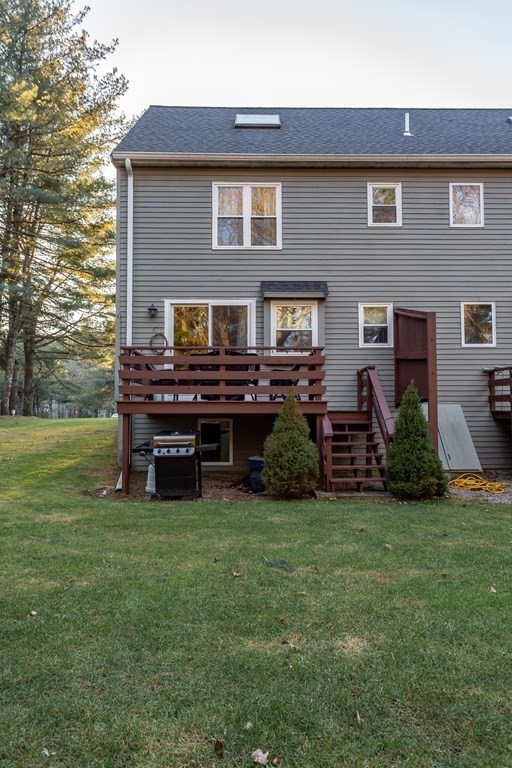 9 Village Way, Unit F Norton, MA 02766 - Photo 19 of 20 a view of a house with a yard and sitting area
