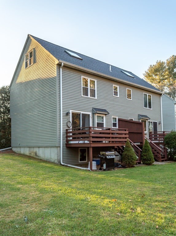 9 Village Way, Unit F Norton, MA 02766 - Photo 20 of 20 a house view with a garden space