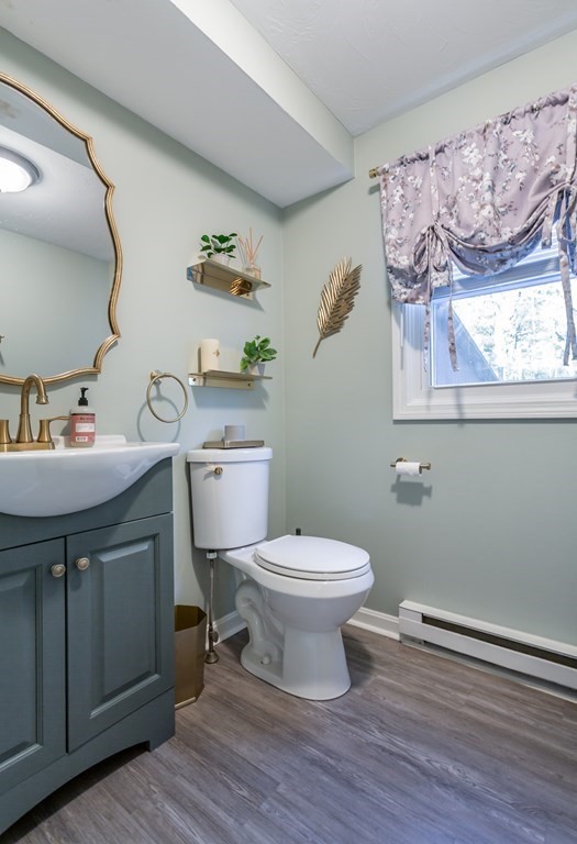 9 Village Way, Unit F Norton, MA 02766 - Photo 9 of 20 a bathroom with a sink and a toilet