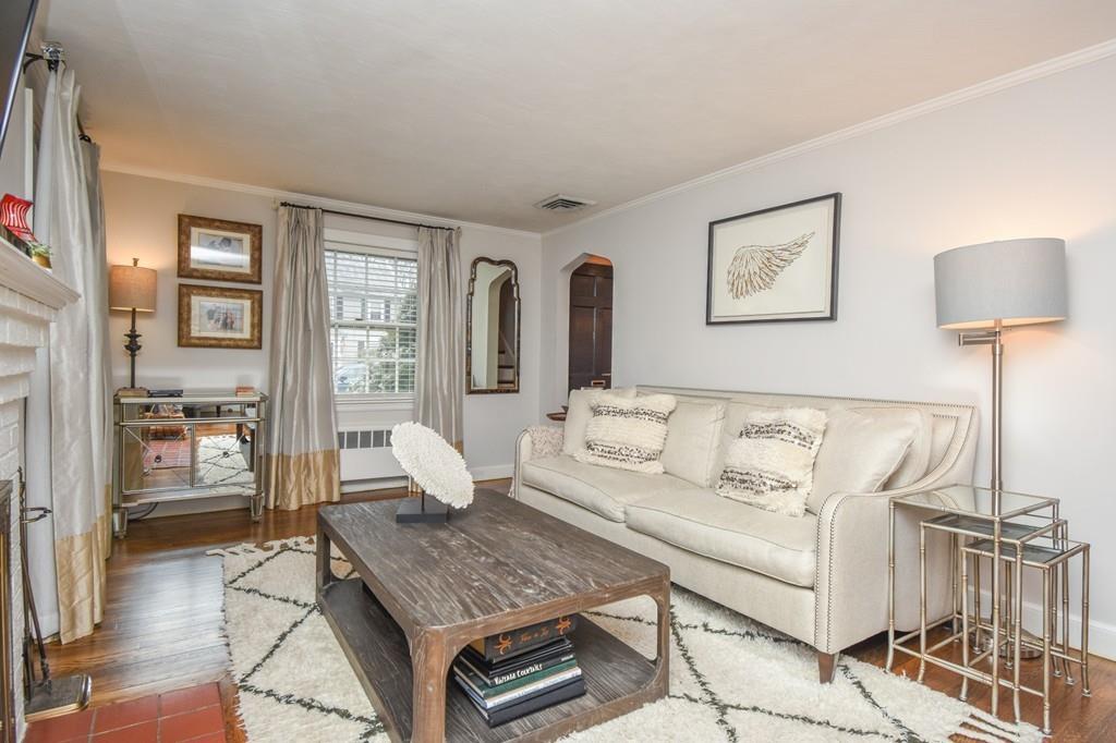21 Lancaster Road Needham, MA 02492 - Photo 14 of 35 a living room with furniture and wooden floor