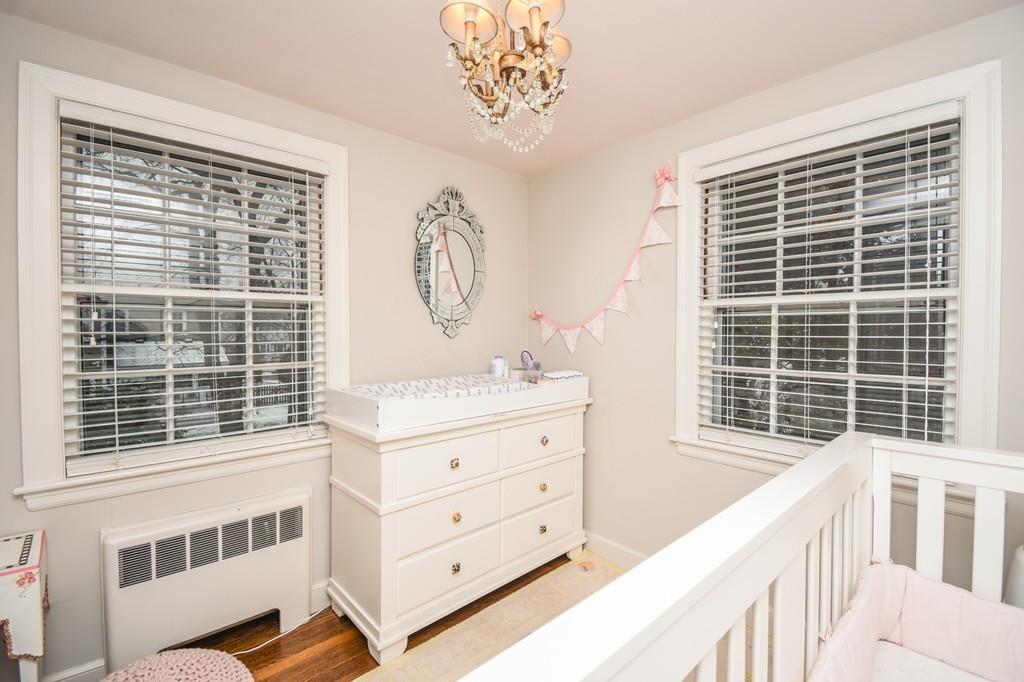 21 Lancaster Road Needham, MA 02492 - Photo 25 of 35 a view of a bedroom with windows