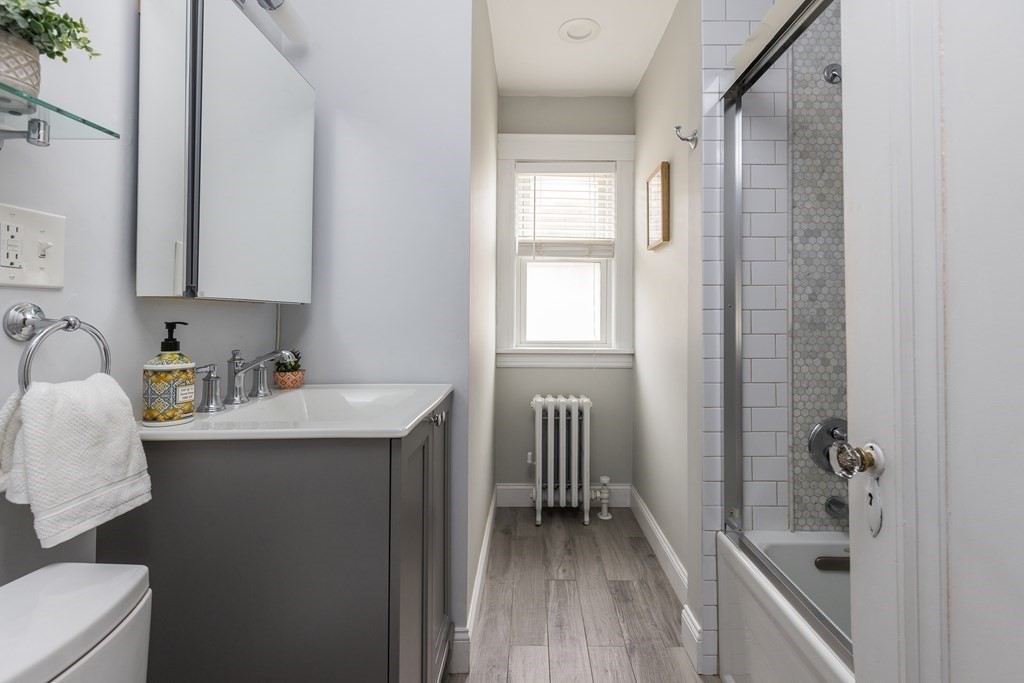 30 Fuller Road, Unit 30 Watertown, MA 02472 - Photo 15 of 24 a bathroom with a sink and a mirror