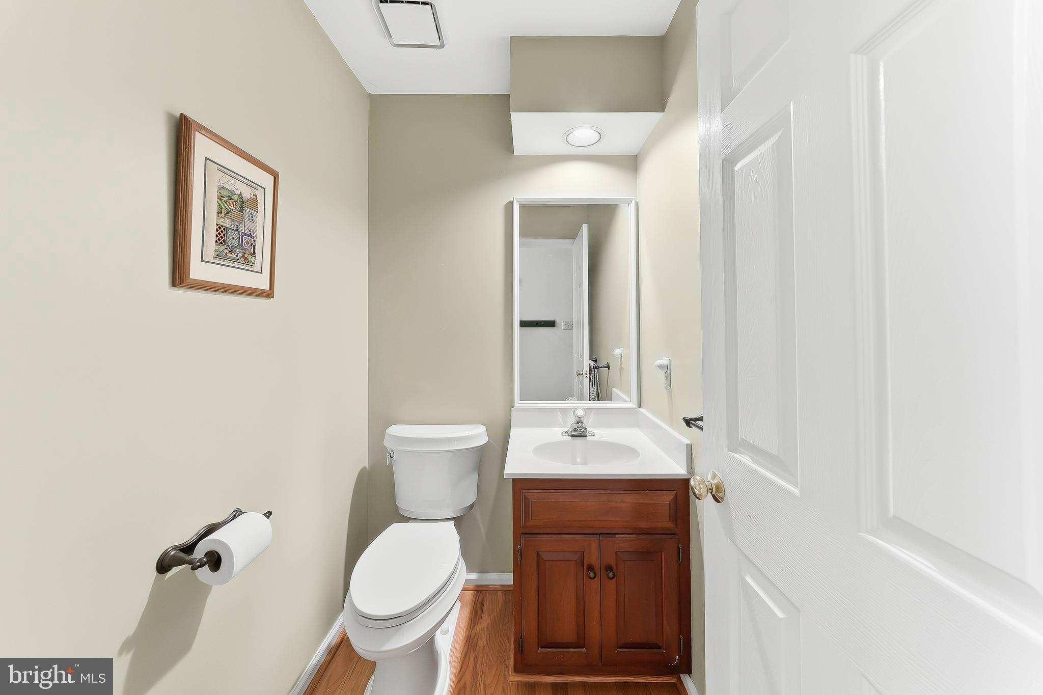 522 Ridge Drive Lincoln University, PA 19352 - Photo 24 of 63 a bathroom with a toilet sink and mirror