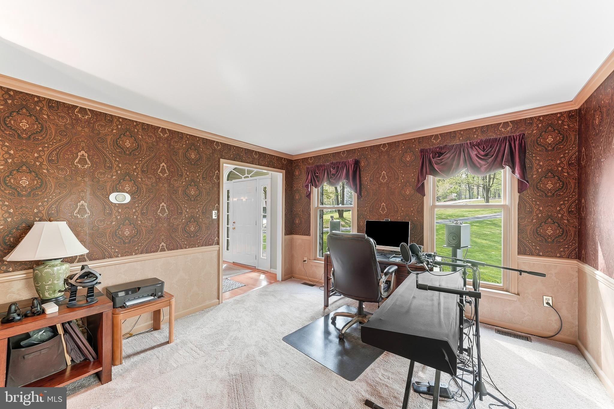 522 Ridge Drive Lincoln University, PA 19352 - Photo 26 of 63 a view of a livingroom with workspace and a window