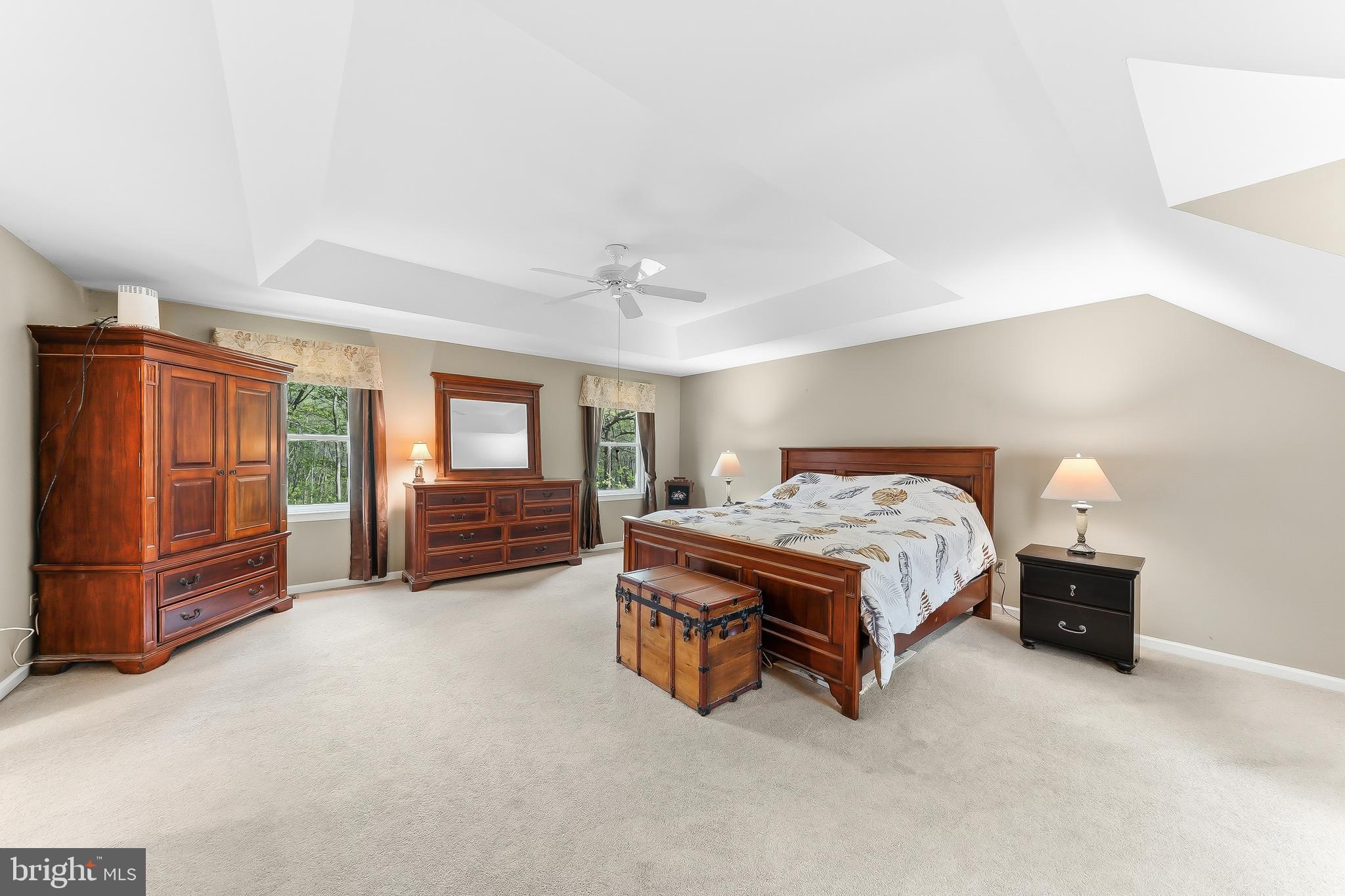 522 Ridge Drive Lincoln University, PA 19352 - Photo 28 of 63 a spacious bedroom with a bed and dresser