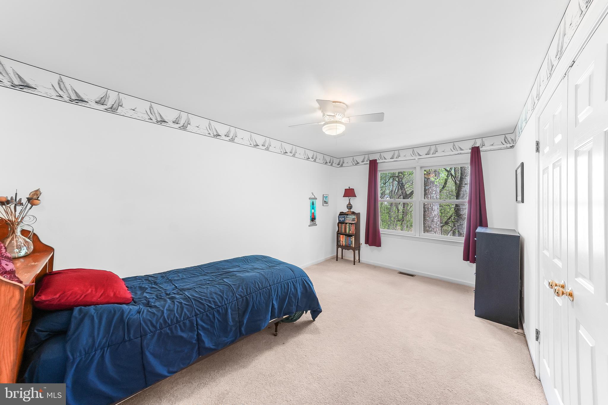 522 Ridge Drive Lincoln University, PA 19352 - Photo 32 of 63 a spacious bedroom with a bed and a window