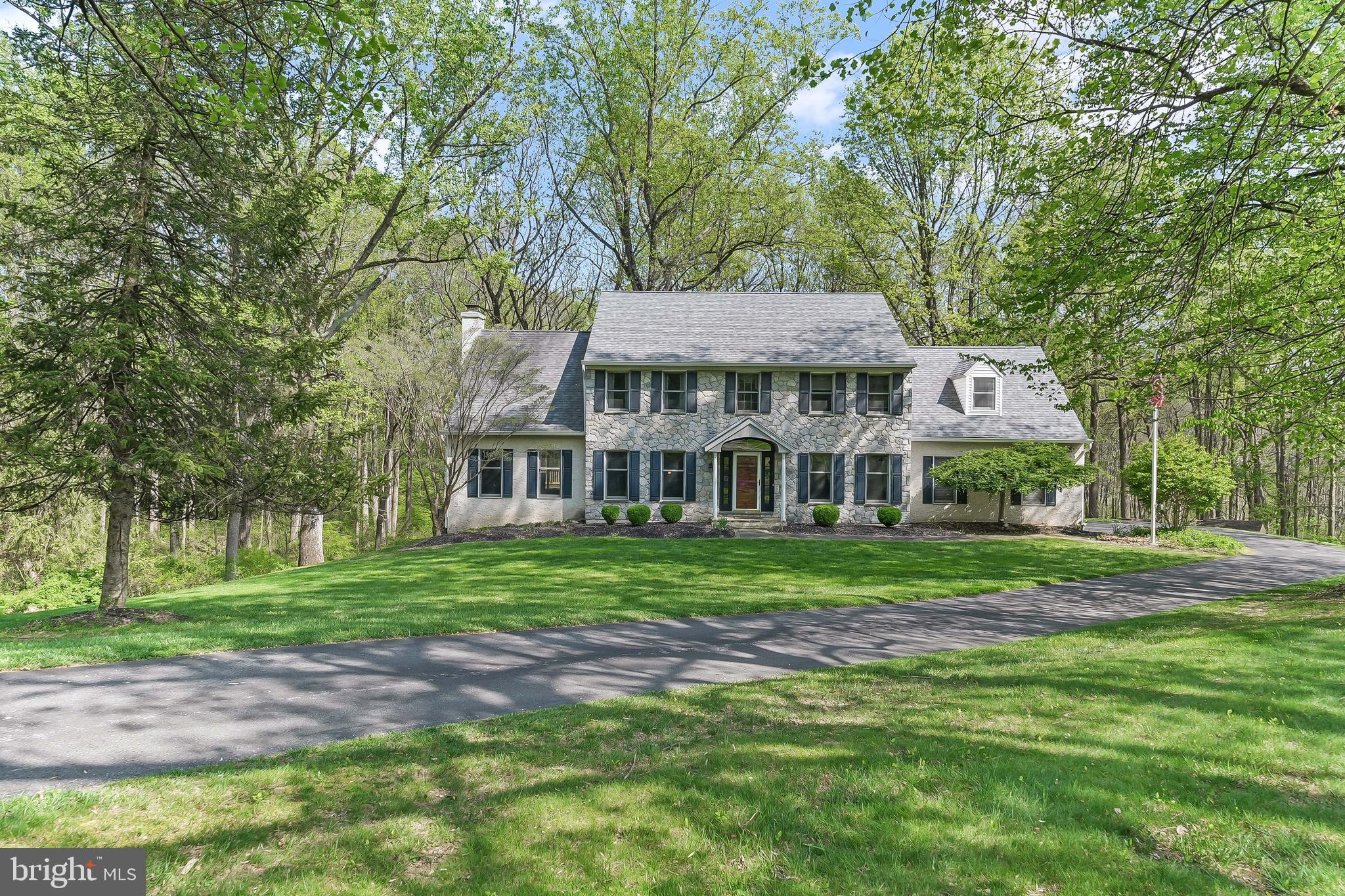 522 Ridge Drive Lincoln University, PA 19352 - Photo 51 of 63 a front view of a house with a garden