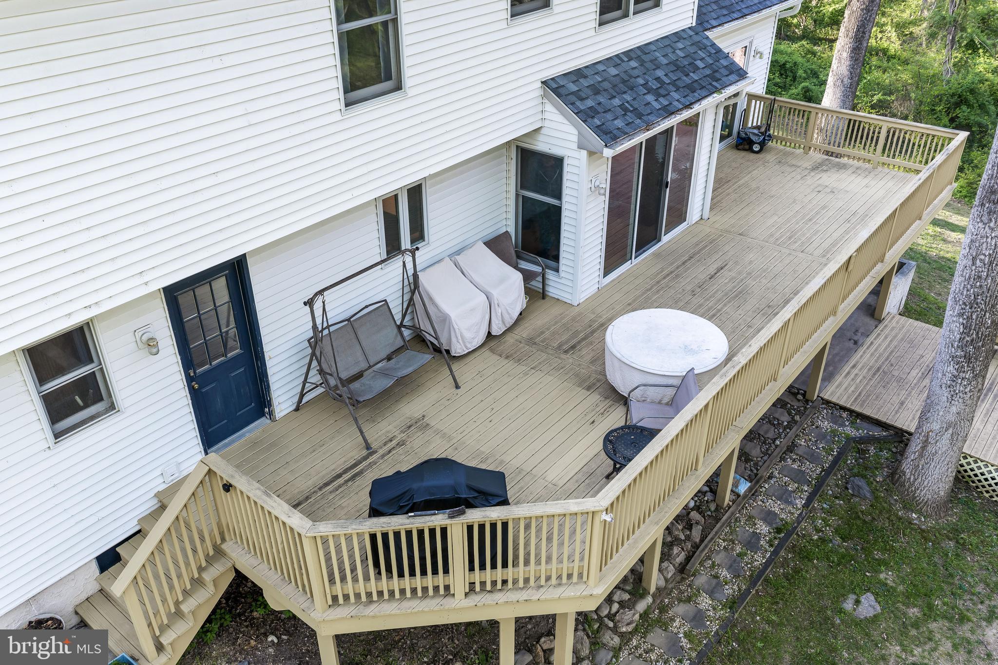 522 Ridge Drive Lincoln University, PA 19352 - Photo 7 of 63 a view of a roof deck with chair and wooden floor