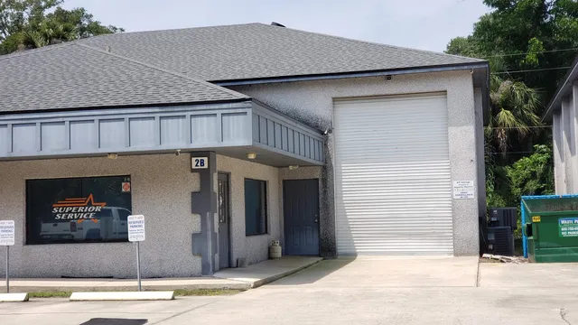 a front view of a house with garage