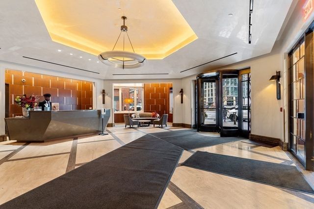 a view of yard from roof deck with patio