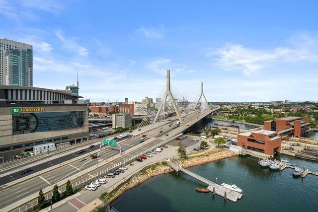 a backyard of a house with yard and outdoor seating