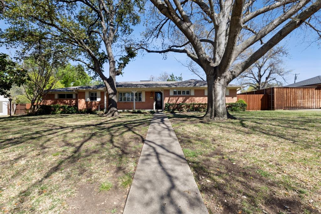 10510 Gooding Drive Dallas, TX 75229 - Photo 2 of 14 a view of swimming pool with outdoor seating and house in the background