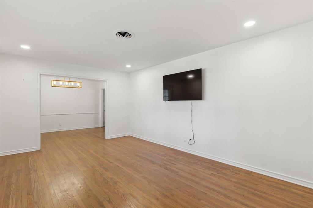 10510 Gooding Drive Dallas, TX 75229 - Photo 9 of 14 a view of a livingroom with wooden floor