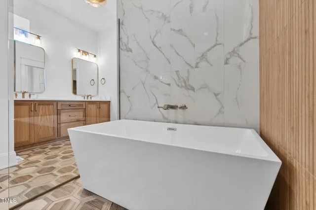 a swimming pool with outdoor seating and yard