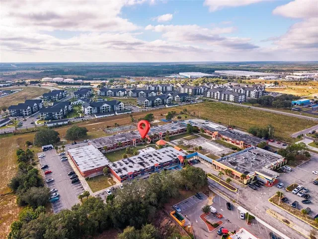 a view of a city with an ocean