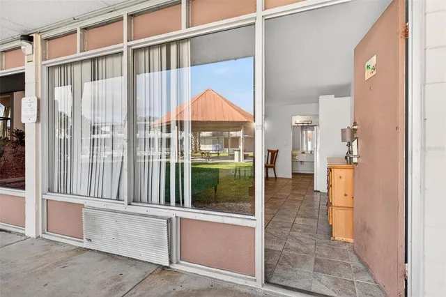 a view of a bathroom with a glass door