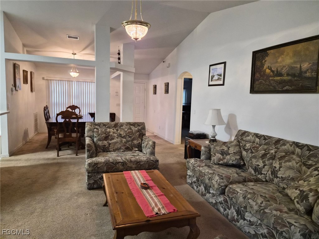 2604 Old Burnt Store Road North Cape Coral, FL 33993 - Photo 11 of 13 a living room with furniture and a couch