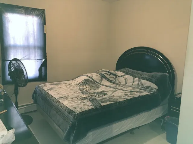 a kitchen with a sink appliances and cabinets