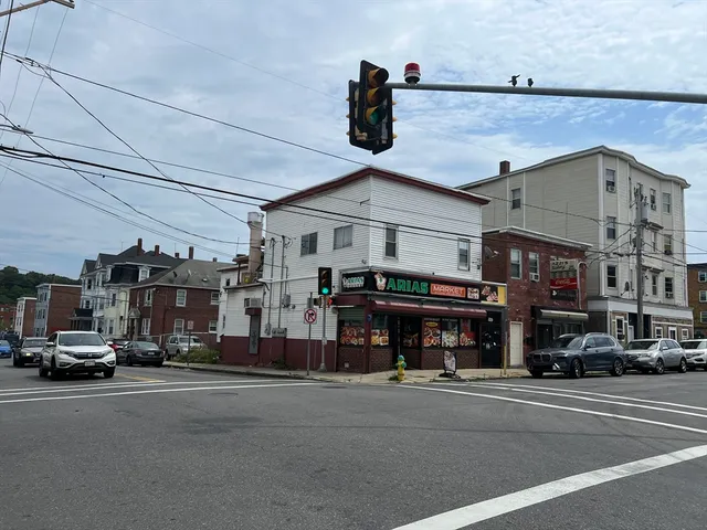 a view of a building with a street