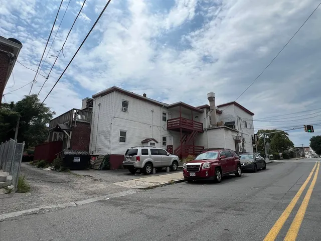 a car parked in front of a house