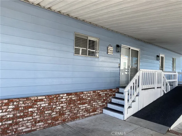 a view of a balcony with stairs