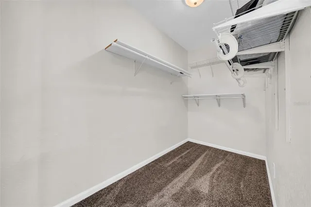 a bathroom with a bathtub sink and mirror