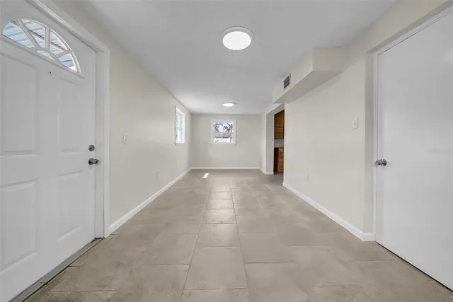 a bathroom with a sink toilet and mirror