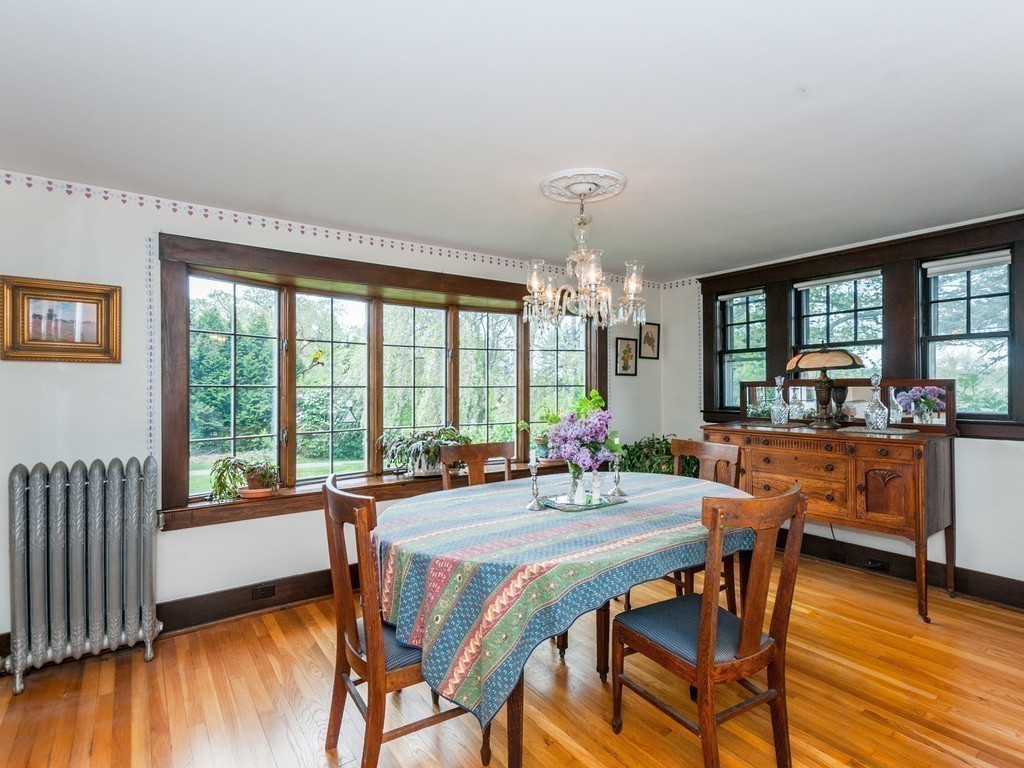 17 Clinton Street Hopkinton, MA 01748 - Photo 12 of 27 a view of a dining room with furniture window and wooden floor