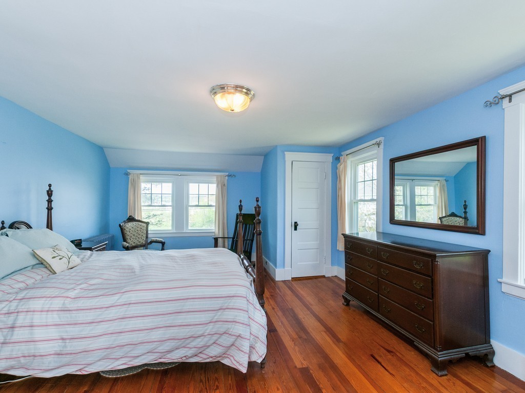 17 Clinton Street Hopkinton, MA 01748 - Photo 15 of 27 a bedroom with a bed and a window