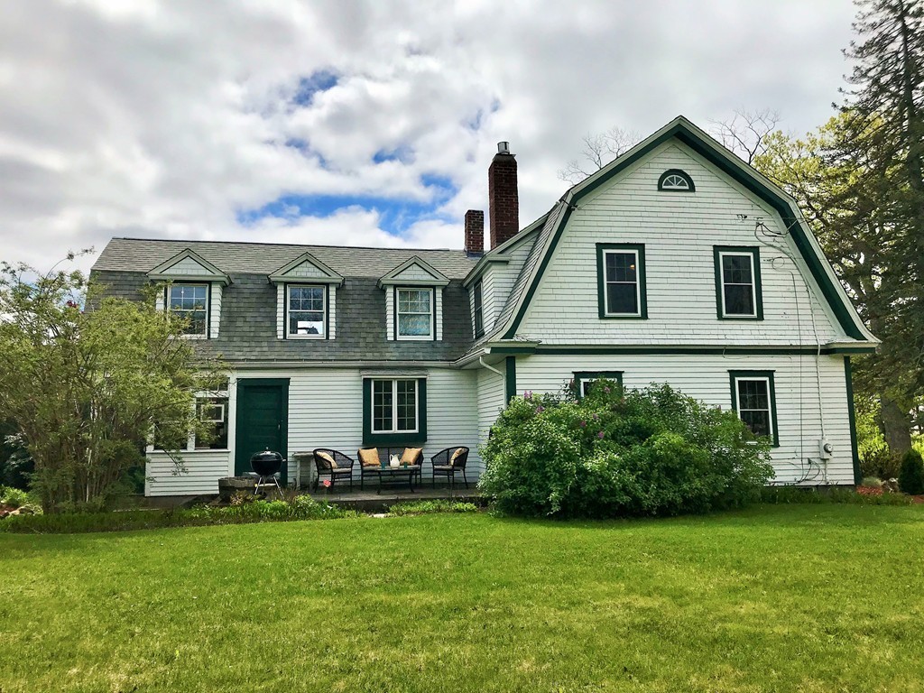 17 Clinton Street Hopkinton, MA 01748 - Photo 2 of 27 a front view of house with yard and green space
