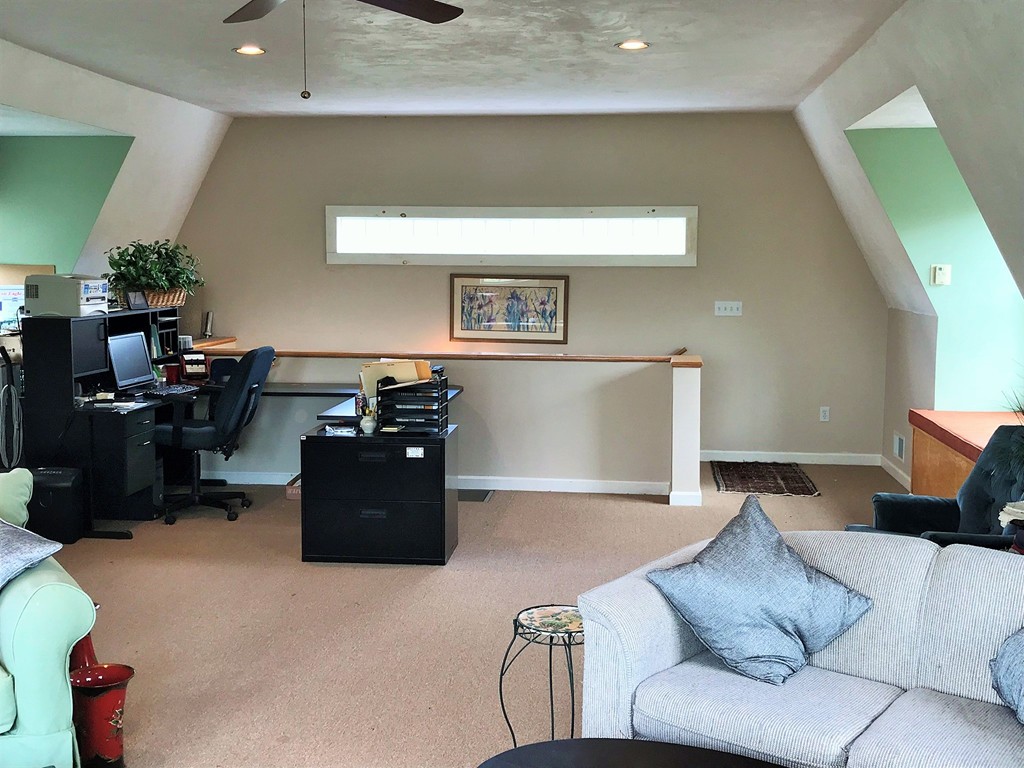 17 Clinton Street Hopkinton, MA 01748 - Photo 27 of 27 a living room with furniture and a flat screen tv