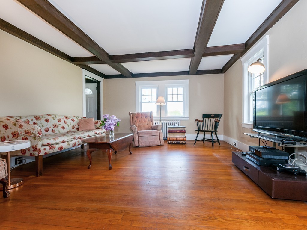 17 Clinton Street Hopkinton, MA 01748 - Photo 6 of 27 a living room with furniture and a flat screen tv