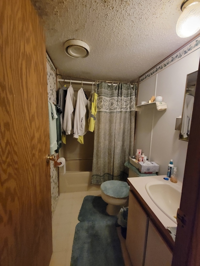 47 Partridge Lane, Unit 47PART Beecher, IL 60401 - Photo 12 of 16 a bathroom with a sink toilet and shower