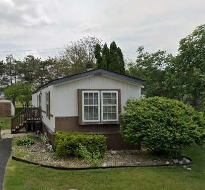47 Partridge Lane, Unit 47PART Beecher, IL 60401 - Photo 2 of 16 a view of a house with backyard and garden