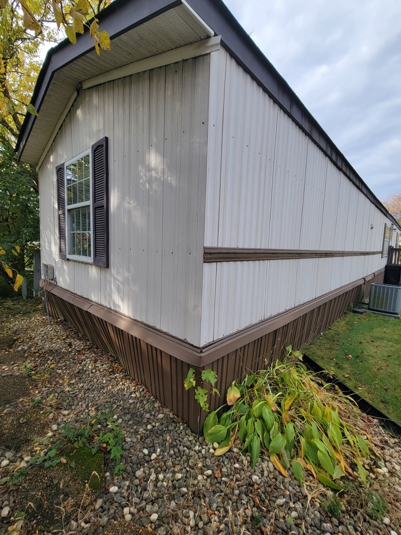 47 Partridge Lane, Unit 47PART Beecher, IL 60401 - Photo 7 of 16 a view of a house with a yard