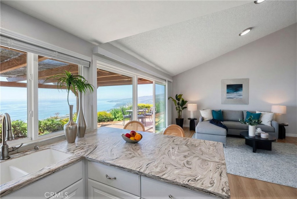 3418 Seaglen Drive Rancho Palos Verdes, CA 90275 - Photo 12 of 42 a kitchen with sink refrigerator and large window