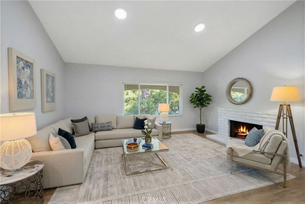 3418 Seaglen Drive Rancho Palos Verdes, CA 90275 - Photo 18 of 42 a living room with furniture fireplace and a large window