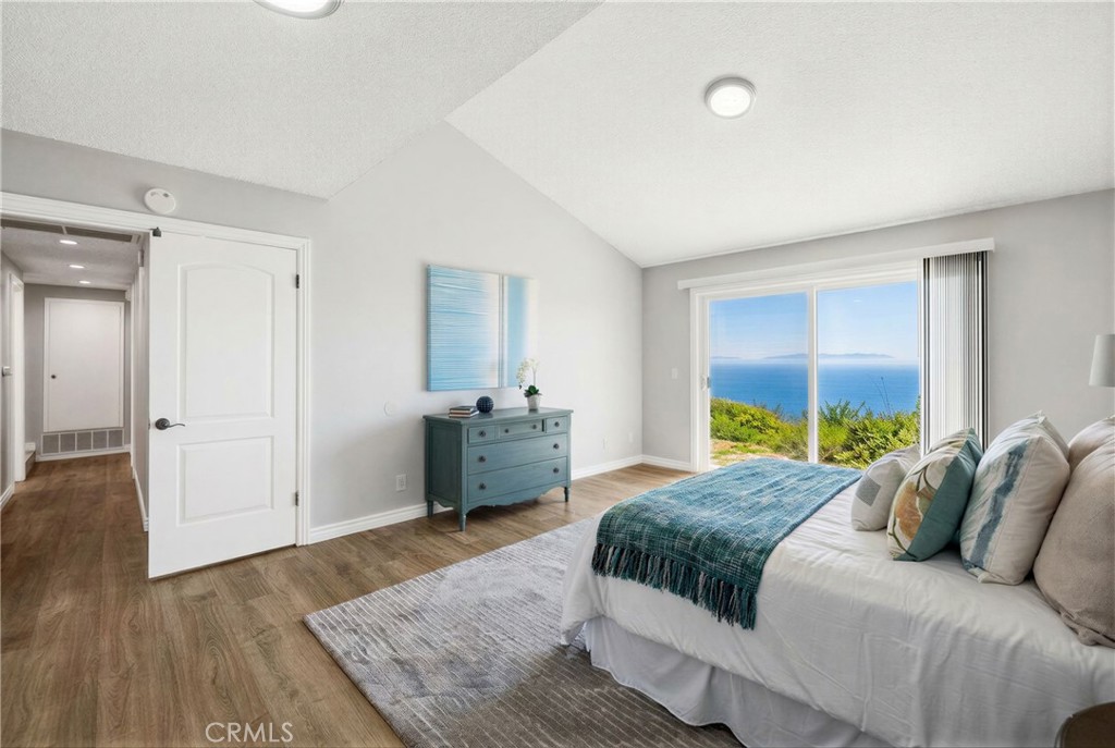 3418 Seaglen Drive Rancho Palos Verdes, CA 90275 - Photo 24 of 42 a bedroom with a bed and a couch