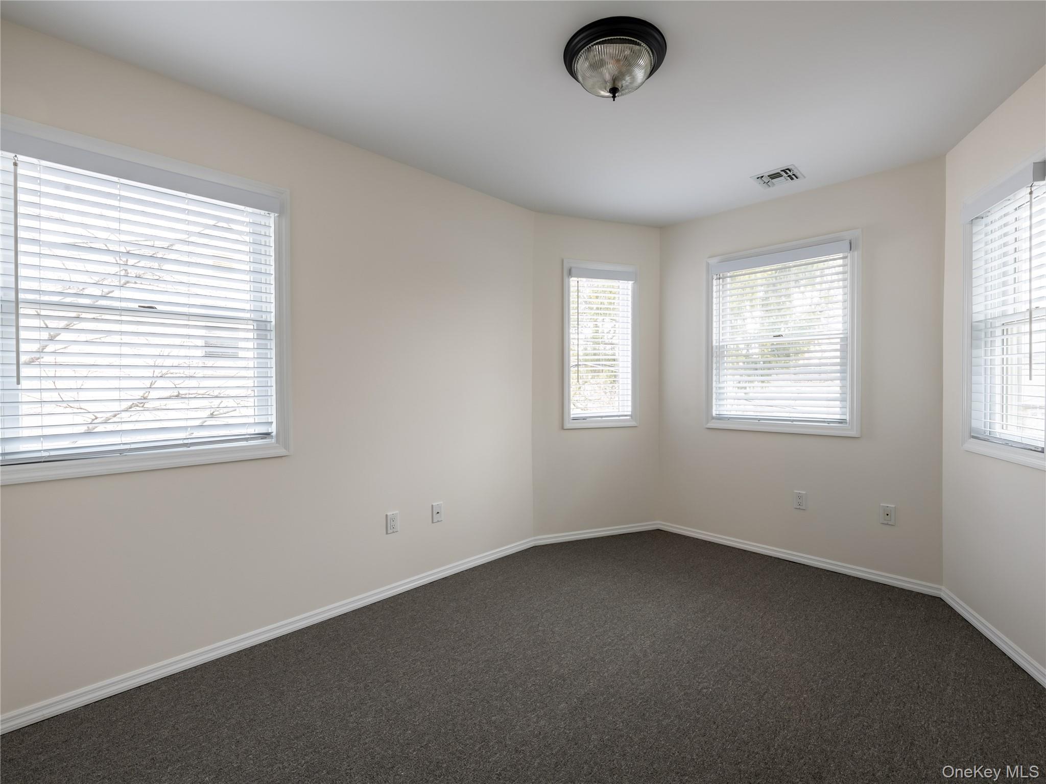 21 Marwood Road North Port Washington, NY 11050 - Photo 34 of 35 an empty room with a window