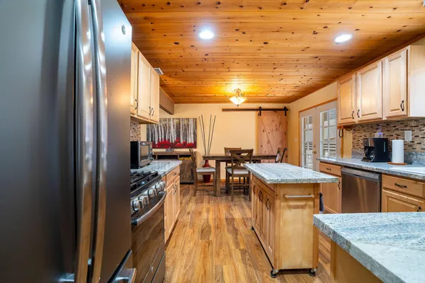 a kitchen with counter space cabinets and appliances
