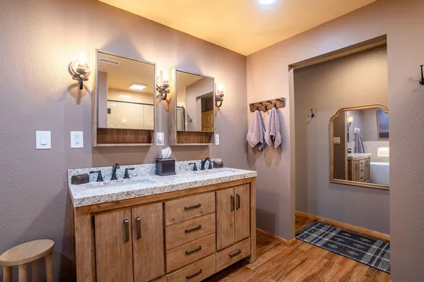 a bathroom with a bathtub and shower
