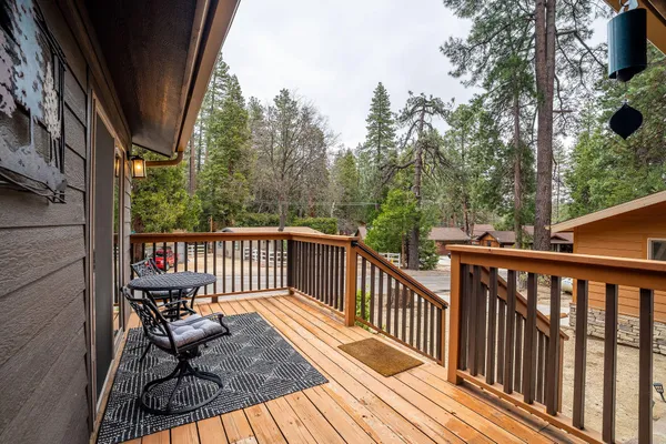 a view of balcony with furniture