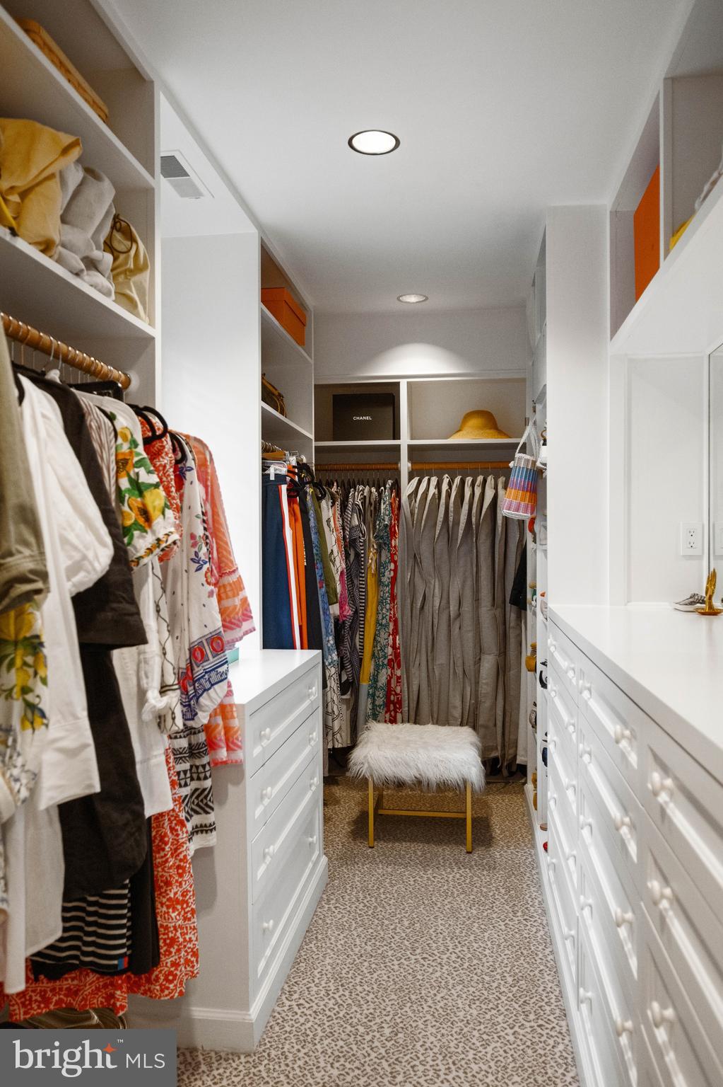 2931 Foxhall Road Northwest Washington, DC 20016 - Photo 32 of 62 a view of walk in closet with clothes