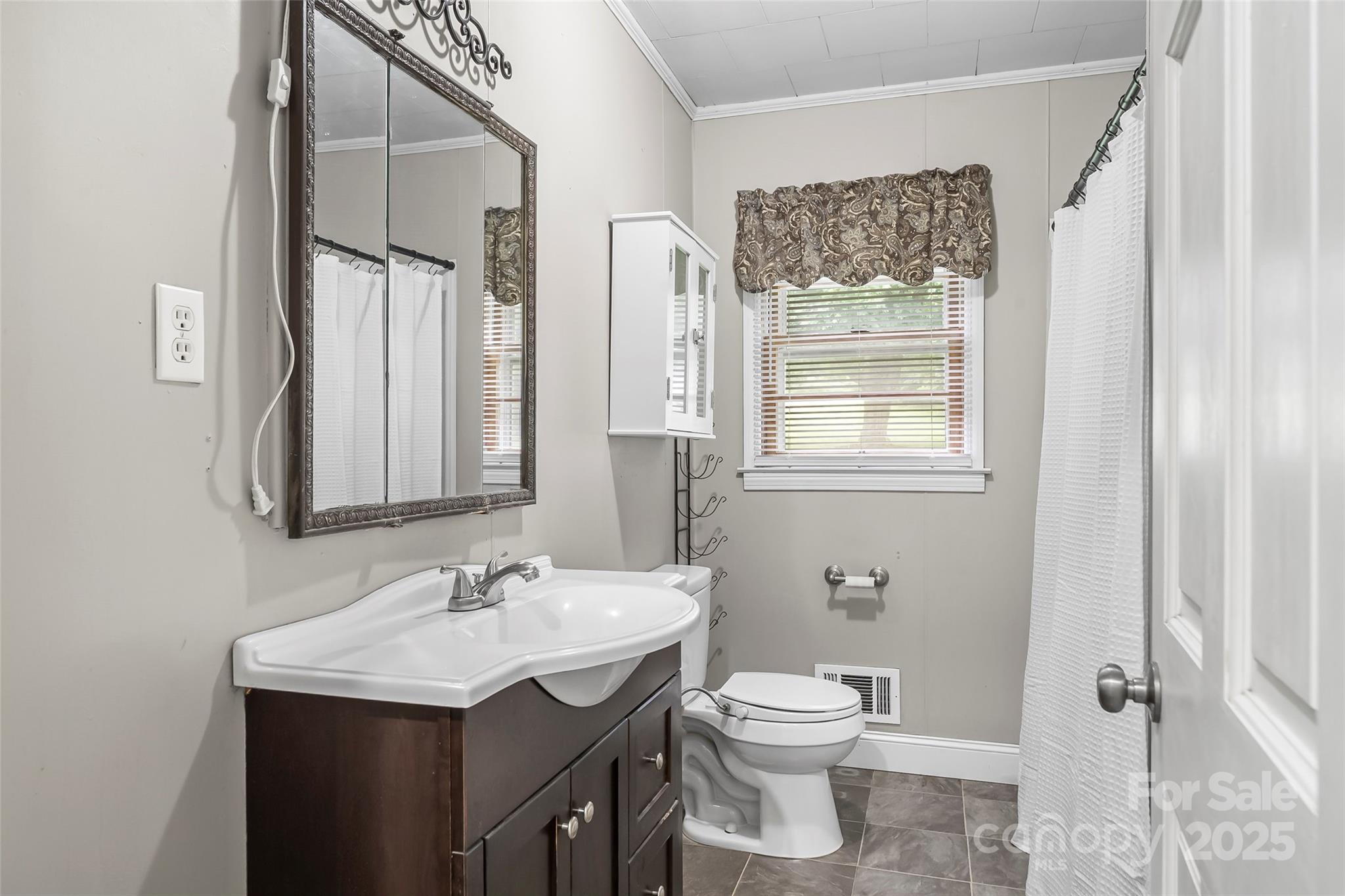 2777 Pax Hill Road Morganton, NC 28655 - Photo 13 of 33 a bathroom with a granite countertop sink toilet and shower