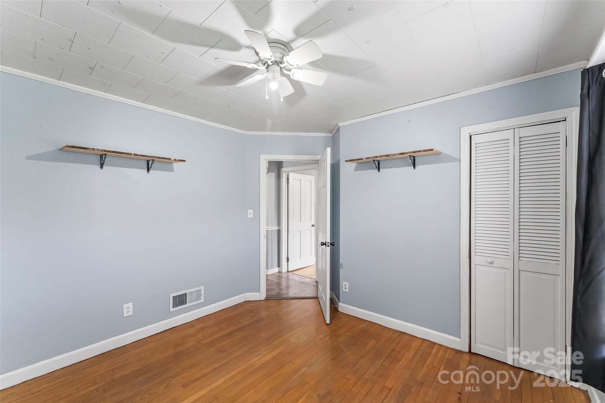 2777 Pax Hill Road Morganton, NC 28655 - Photo 17 of 33 a view of an empty room with wooden floor