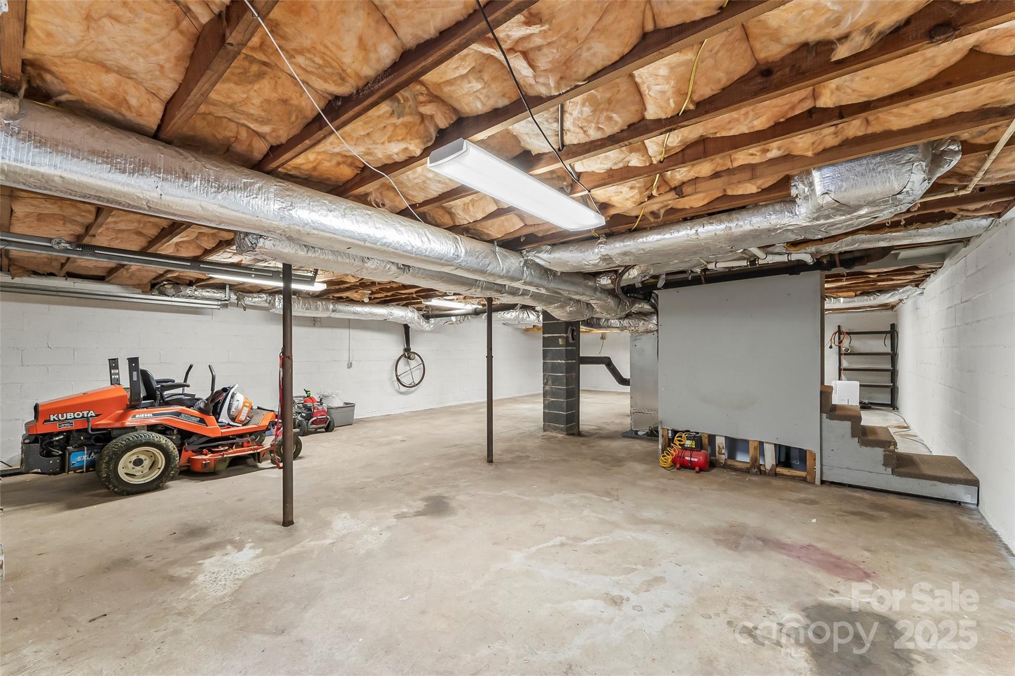 2777 Pax Hill Road Morganton, NC 28655 - Photo 20 of 33 a view of parking garage with cars