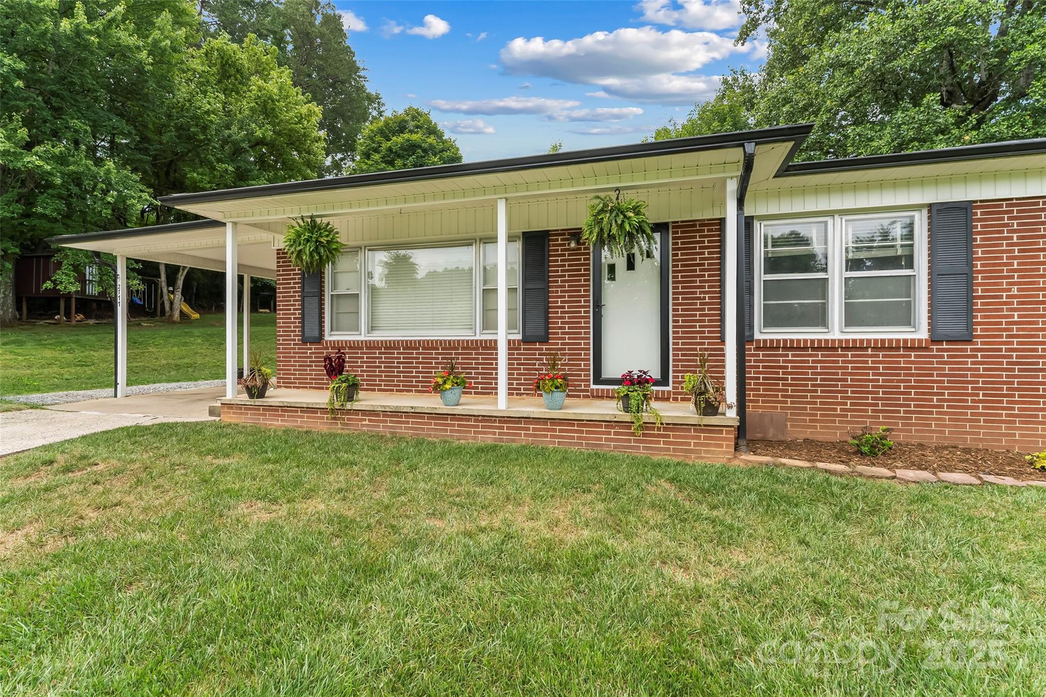 2777 Pax Hill Road Morganton, NC 28655 - Photo 2 of 33 front view of a house with a yard
